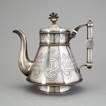 A Russian 19th century parcel-gilt tea-pot, mark of Nicolai Kemper, St. Petersburg 1882.