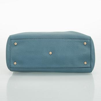 Gucci, a 'Bamboo shopper' bag.