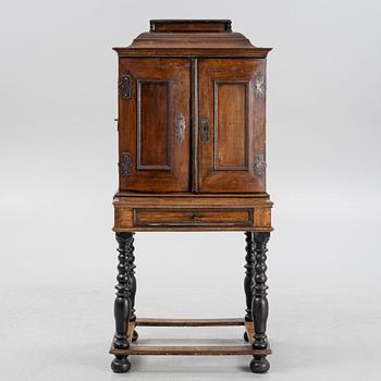 A Baroque cabinet, 18th Century.