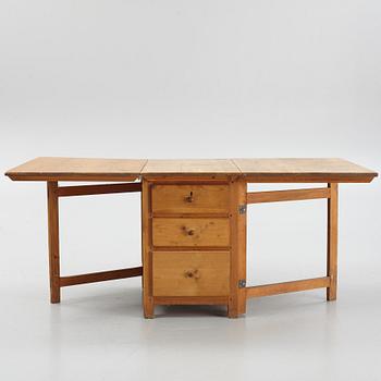 A 19th century pine gate legged table.