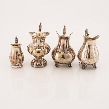 A set of four Swedish 19th century silver creamer.