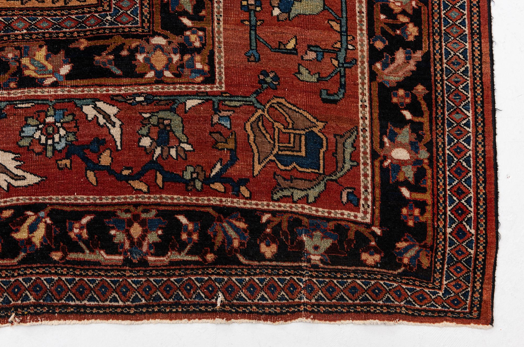 An antique 'khan carpet', Bakhtiari, western persia. c. 550 x 350 cm.