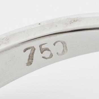 Ring in 18K white gold set with a faceted sapphire and round brilliant-cut and modified baguette-cut diamonds.