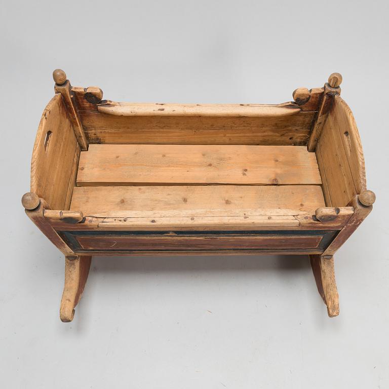 A cradle dated 18.9 1845.