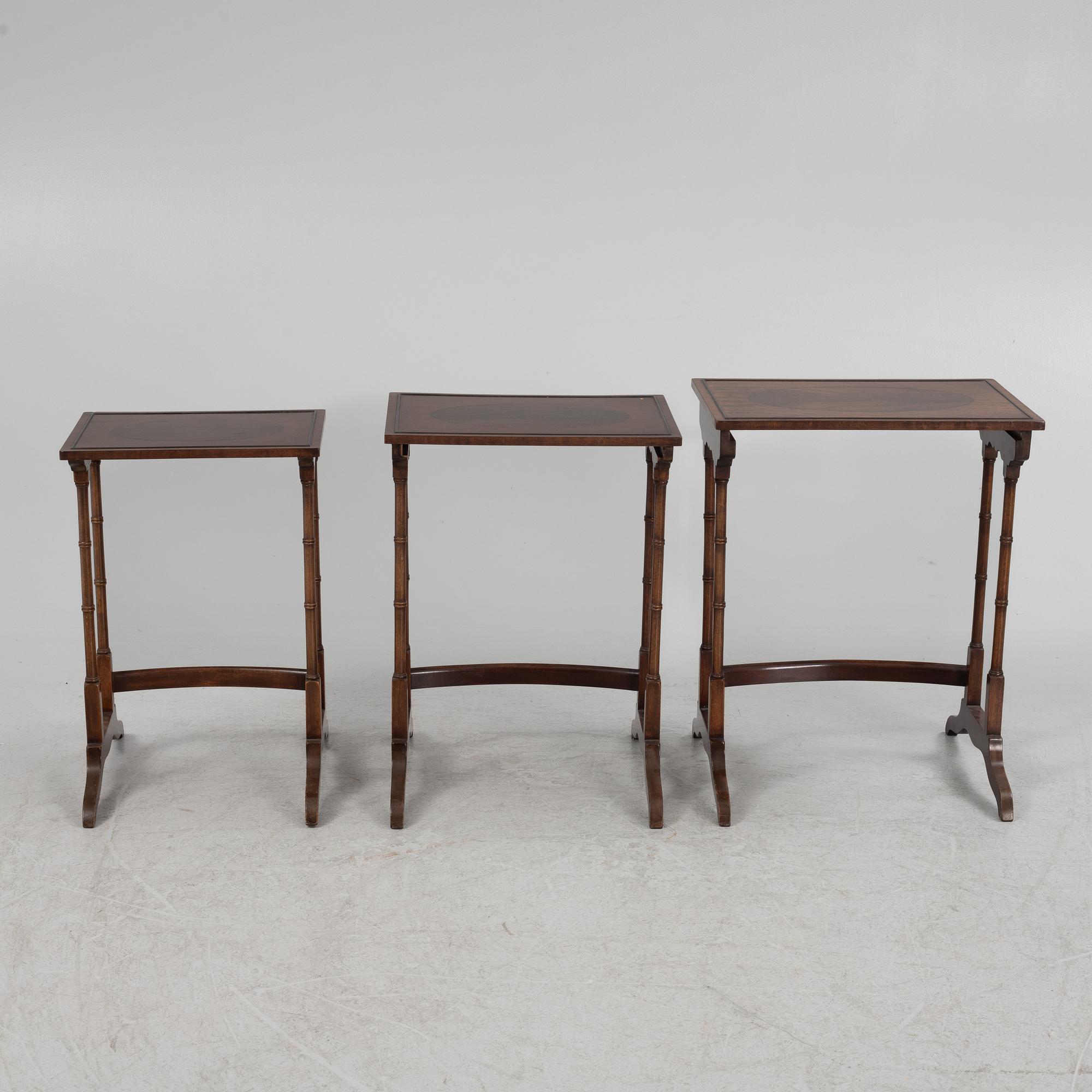 Three-piece nest of tables, mid-20th century.