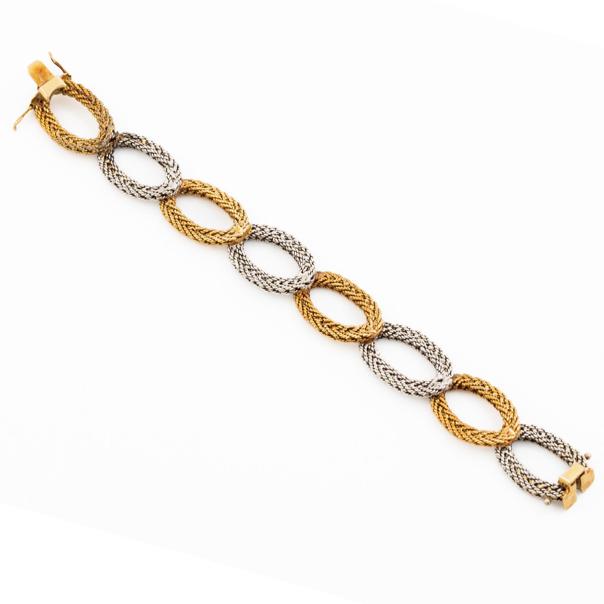 Armband 14K tvåfärgat guld i form av flätade ovala länkar, omkring ca 1950-70-tal.