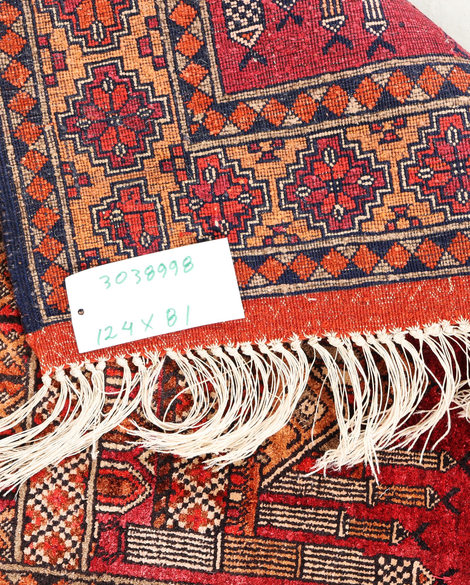 A silk Beluch rug, c. 124 x 81 cm.