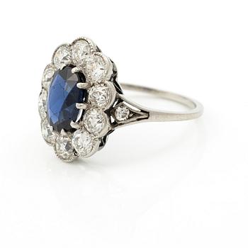 Carmose ring in platinum with sapphire and old-cut diamonds.