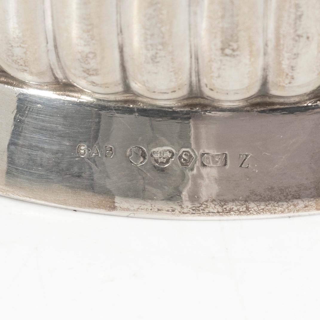 Guldsmedsaktiebolaget (GAB), A Swedish silver coffee pot, cream jug and sugar bowl, mark of GAB, Stockholm 1918-1919.