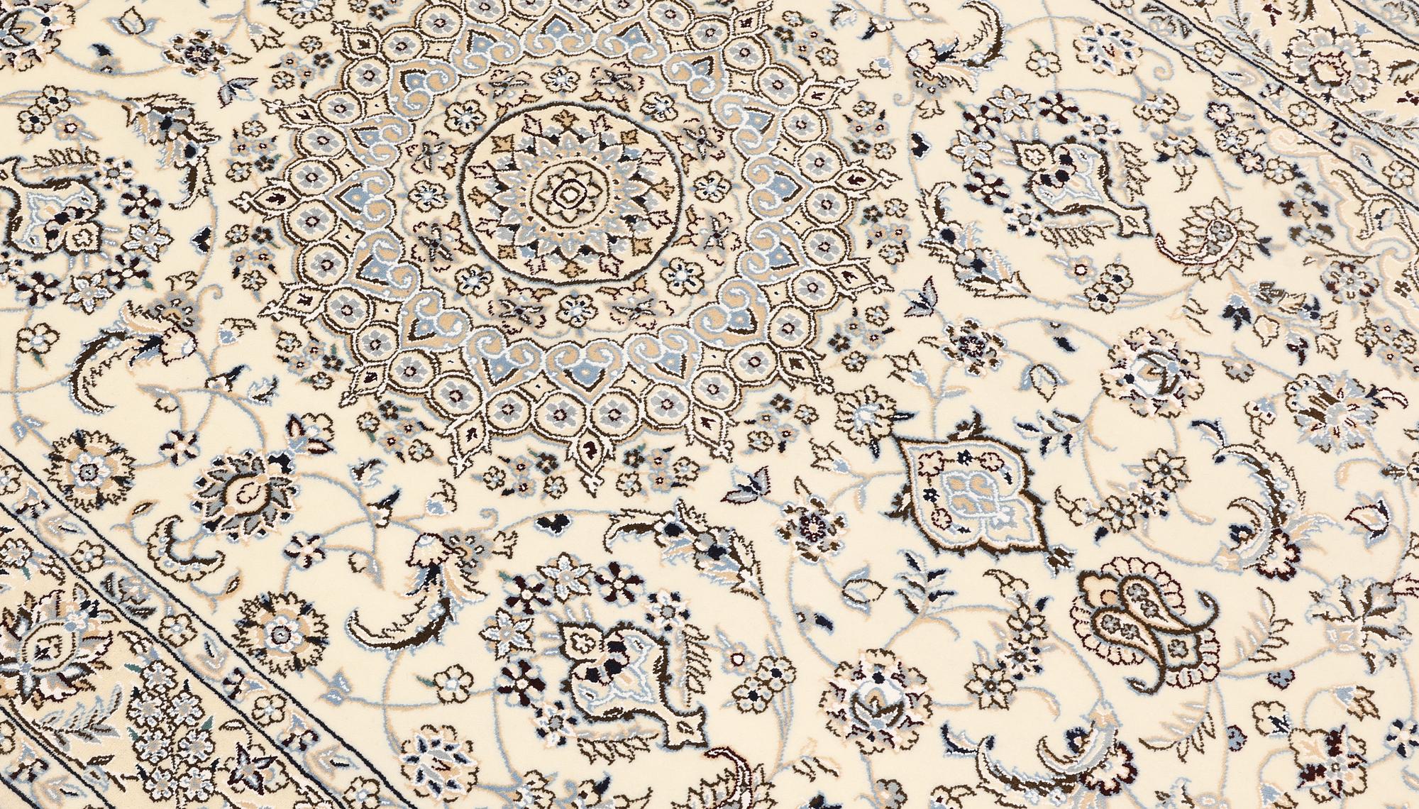 A Nain rug, part silk, so-called 9LAA, c. 210 x 130 cm.