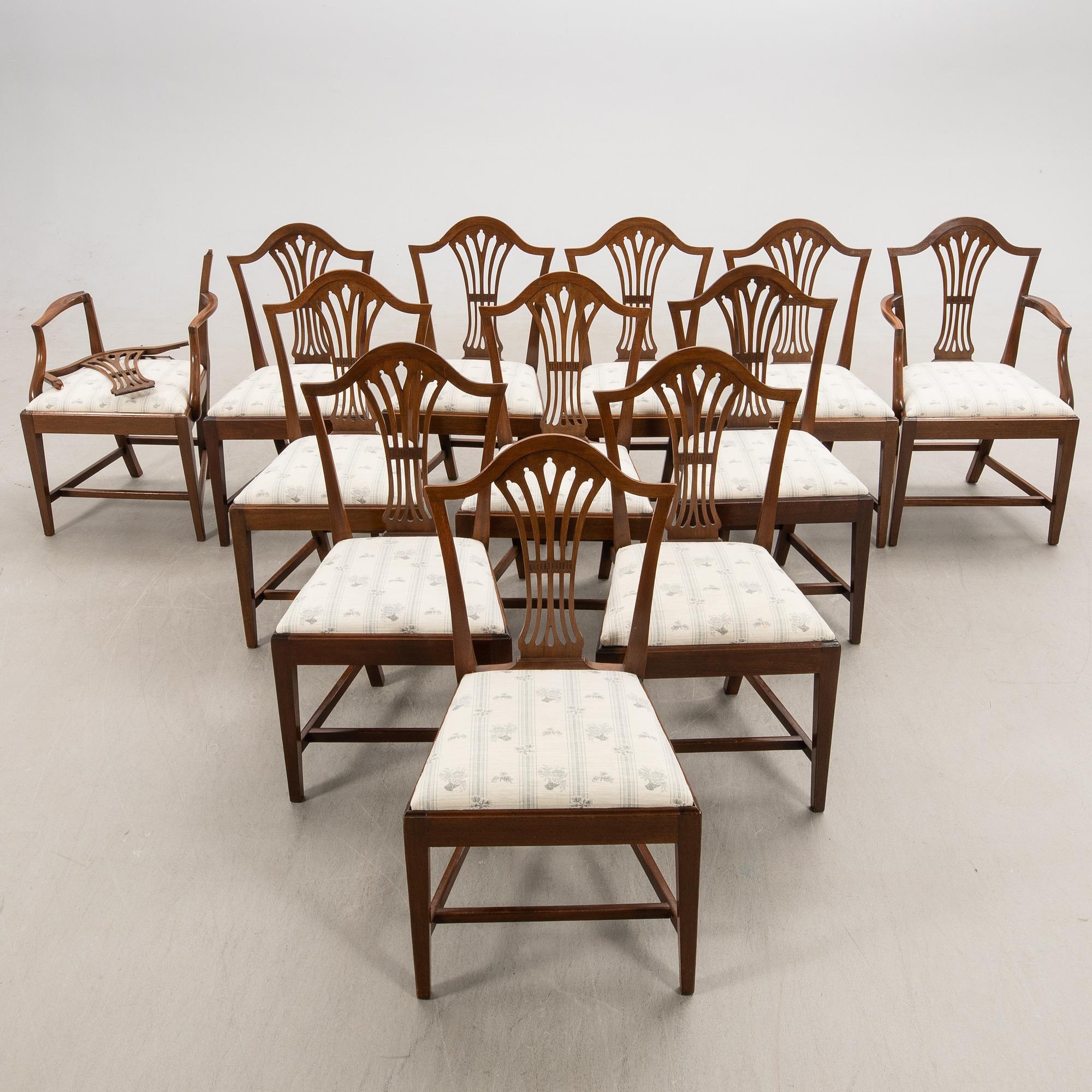 Chairs 10 pcs and armchairs 1 pair Chippendale style England circa 1900.
