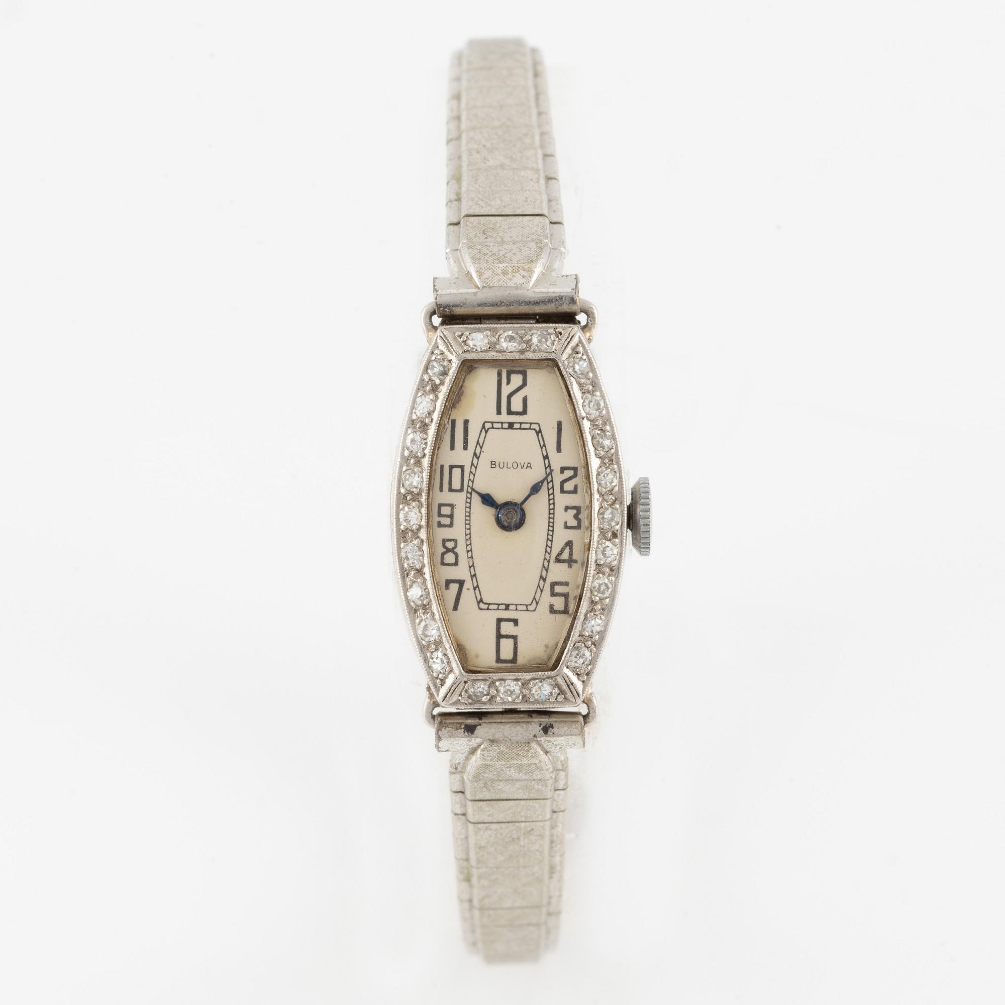 Bulova, wristwatch, platinum with diamonds, bracelet in steel.