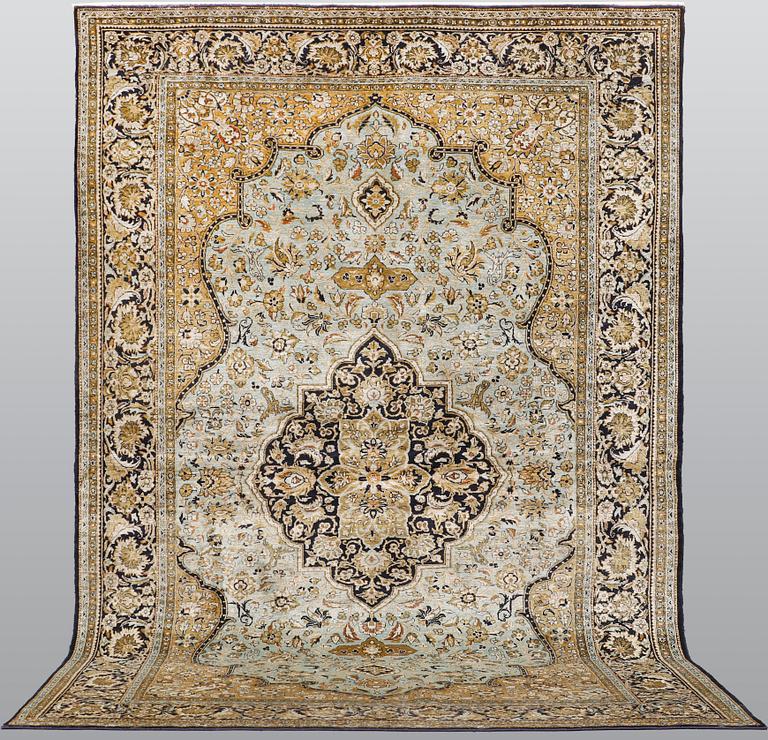 A carpet, silk Qum, ca 203 x 134 cm.