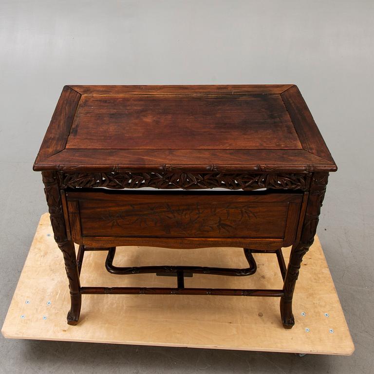 An Asian 20th century serving table.