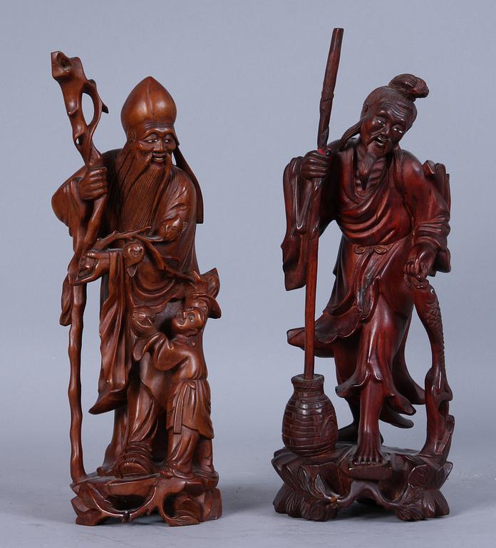 FIGURER, 2 st, trä, orientaliska, 1900-tal.