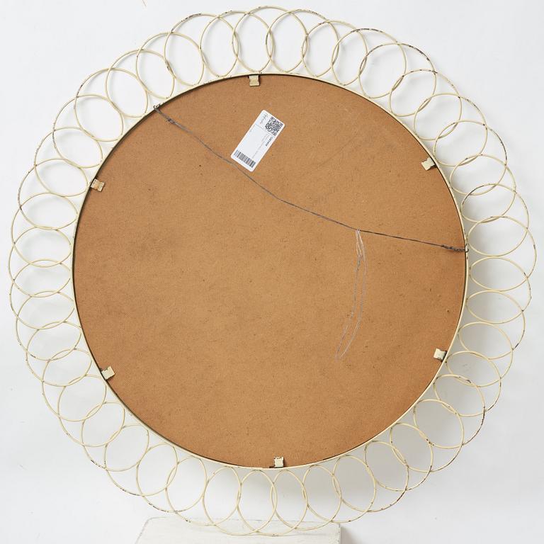 A painted metal mirror, first half of the 20th century.