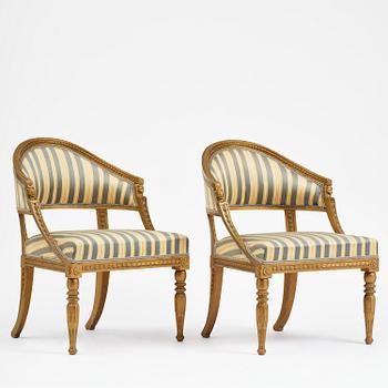 A pair of late Gustavian open armchairs attributed to E. Ståhl (master in Stockholm 1794-1820).