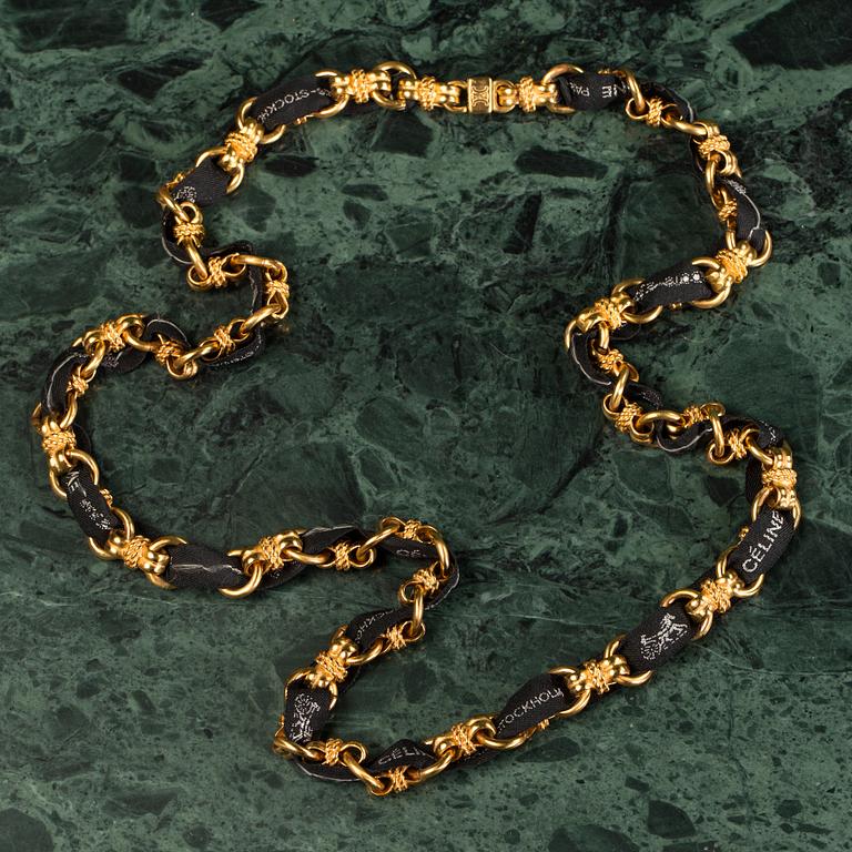 A necklace by CÉLINE.