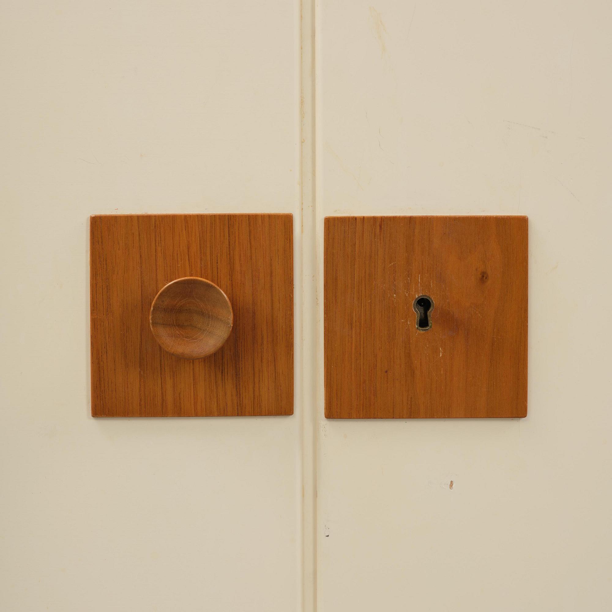 Josef Frank, a set of three bookcases model "B 2255", Firma Svenskt Tenn, mid-20th century, provenance Estrid Ericson.