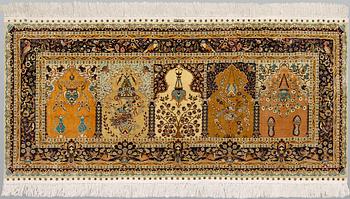 A Oriental silk rug, 182 x 89 cm.