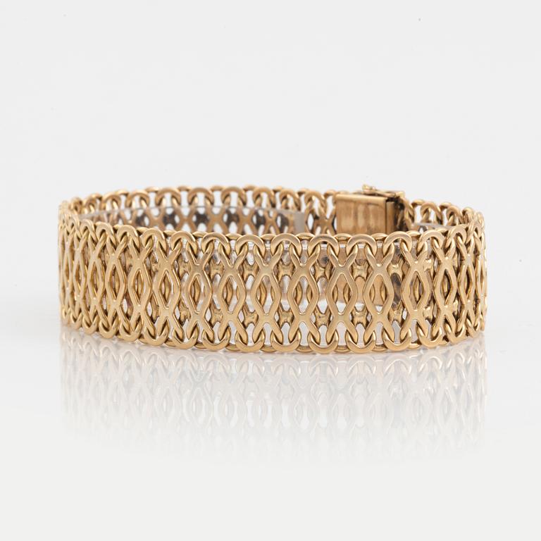 An 18K gold bracelet by CF Carlman.