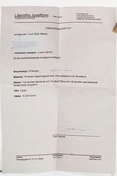 Earrings 18k whitegold, 2 briolette-cut rock-crystals and 2 brilliant-cut diamonds 0,20 ct TW VVS.