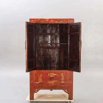 A 20th century Chinese painted wooden cabinet.