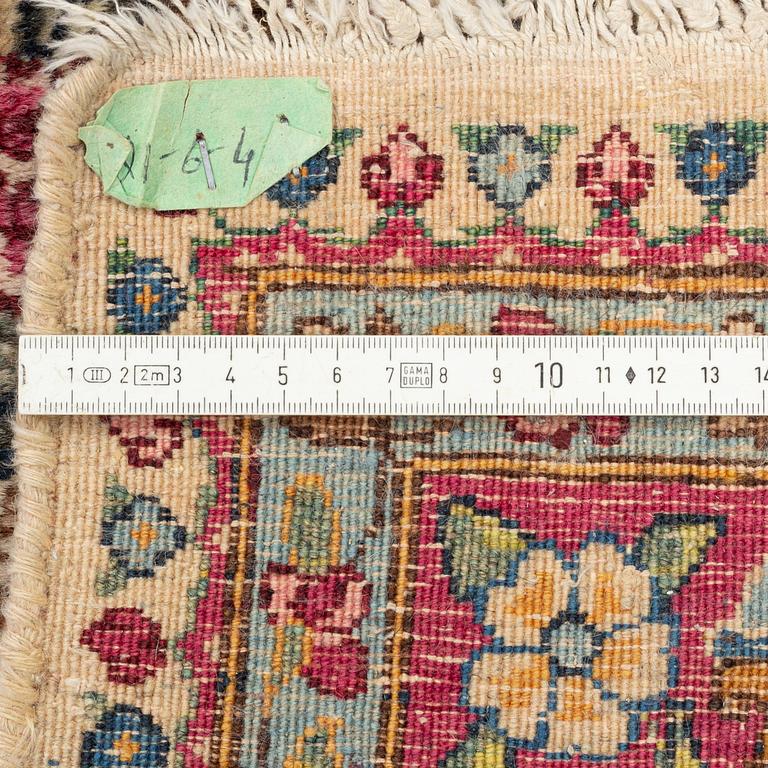 A carpet, Kerman, ca 323 x 213 cm.