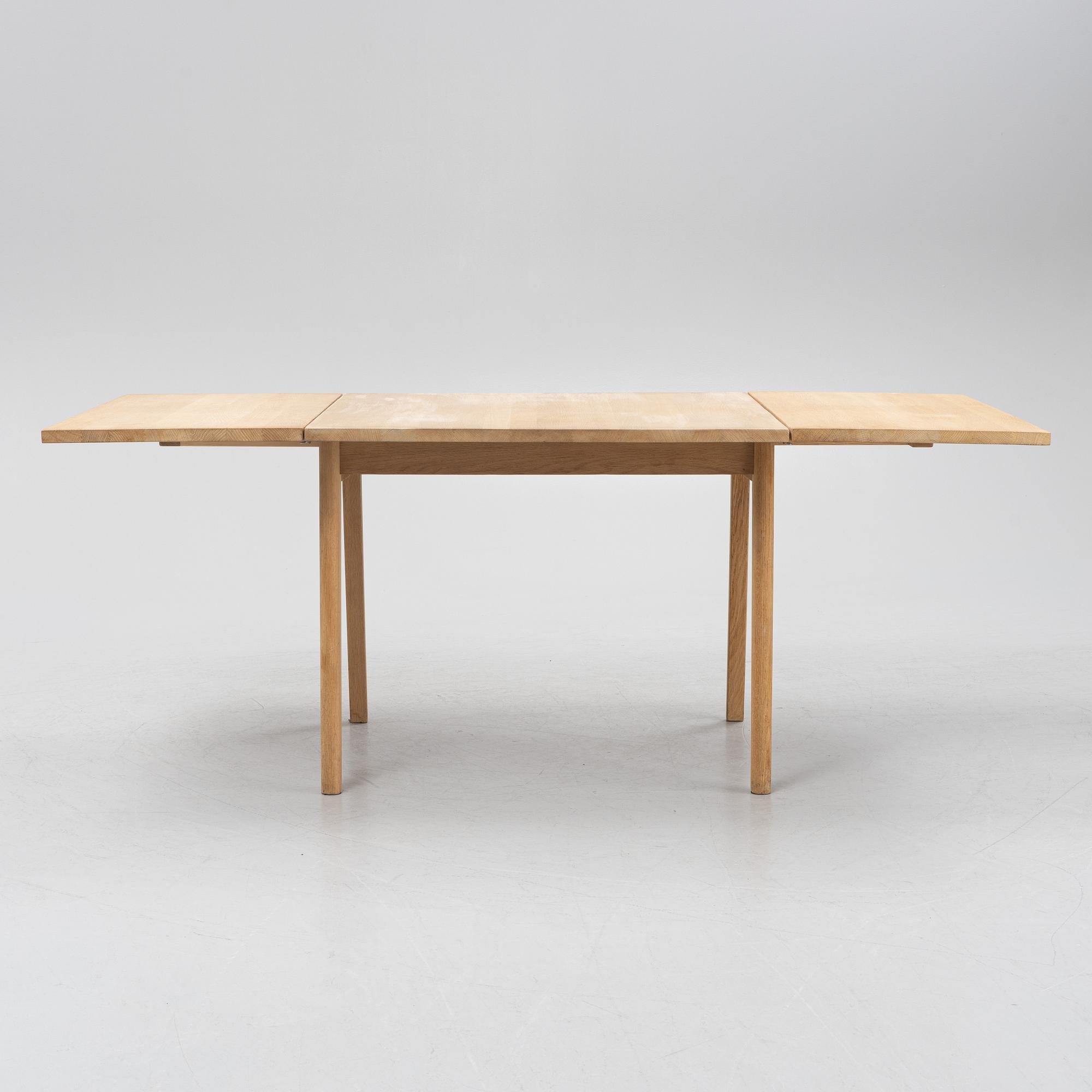 Hans J. Wegner, a model "AT-313" dining table, Carl Hansen & Søn, Denmark.