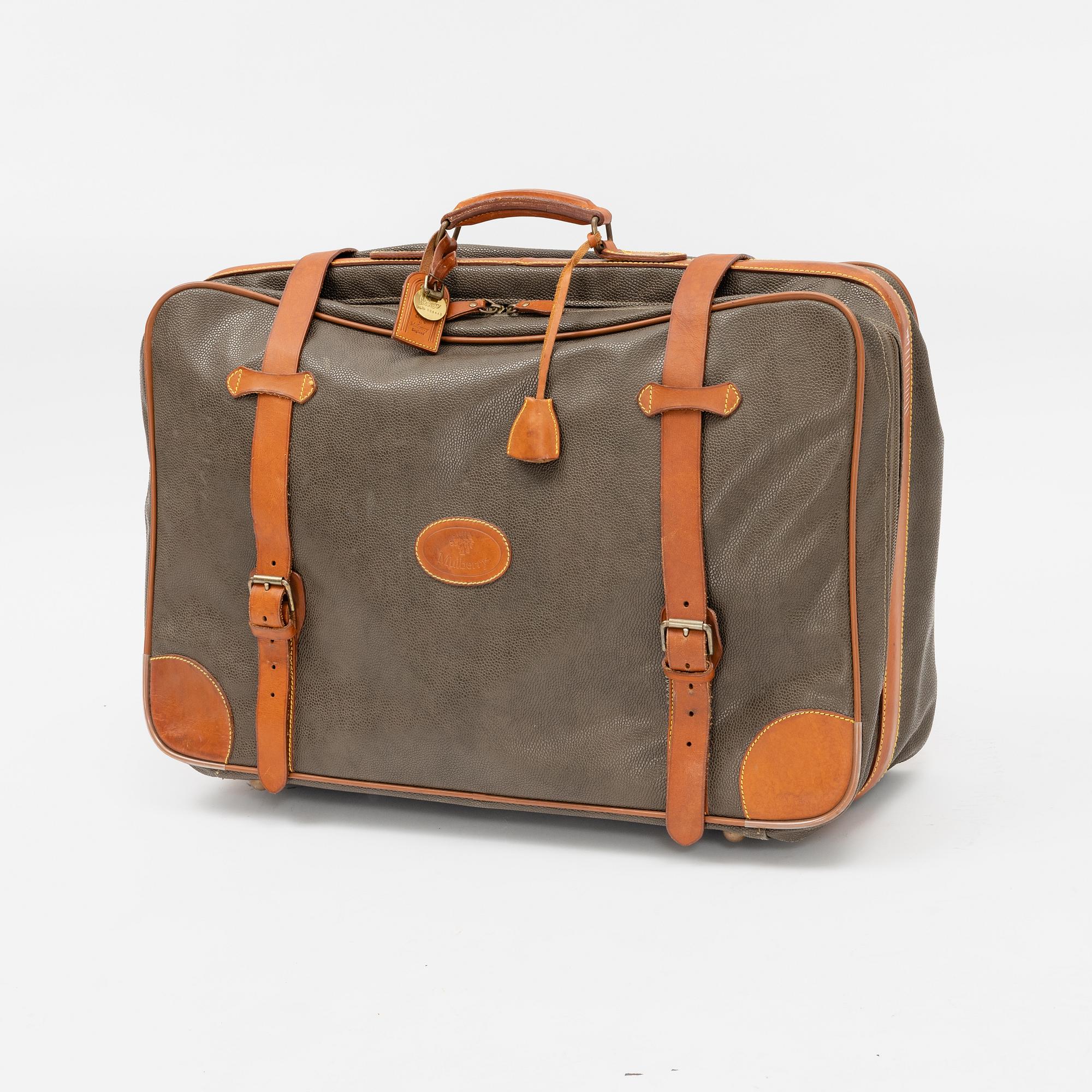 Mulberry, a scotch grain suitcase.