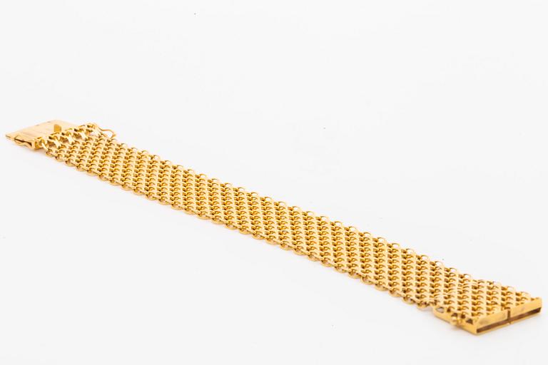 ARMBAND 18K guld bred x-länk, 48,5 g, Ädelsmycken AB Stockholm 1963.