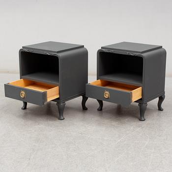 A pair of mid 20th century painted bedside tables.