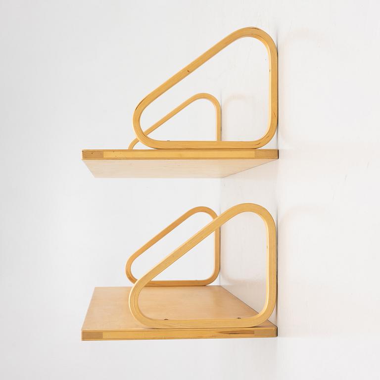 Alvar Aalto, a pair of wall shelves, model 112A, Artek, Finland, late 20th Century.