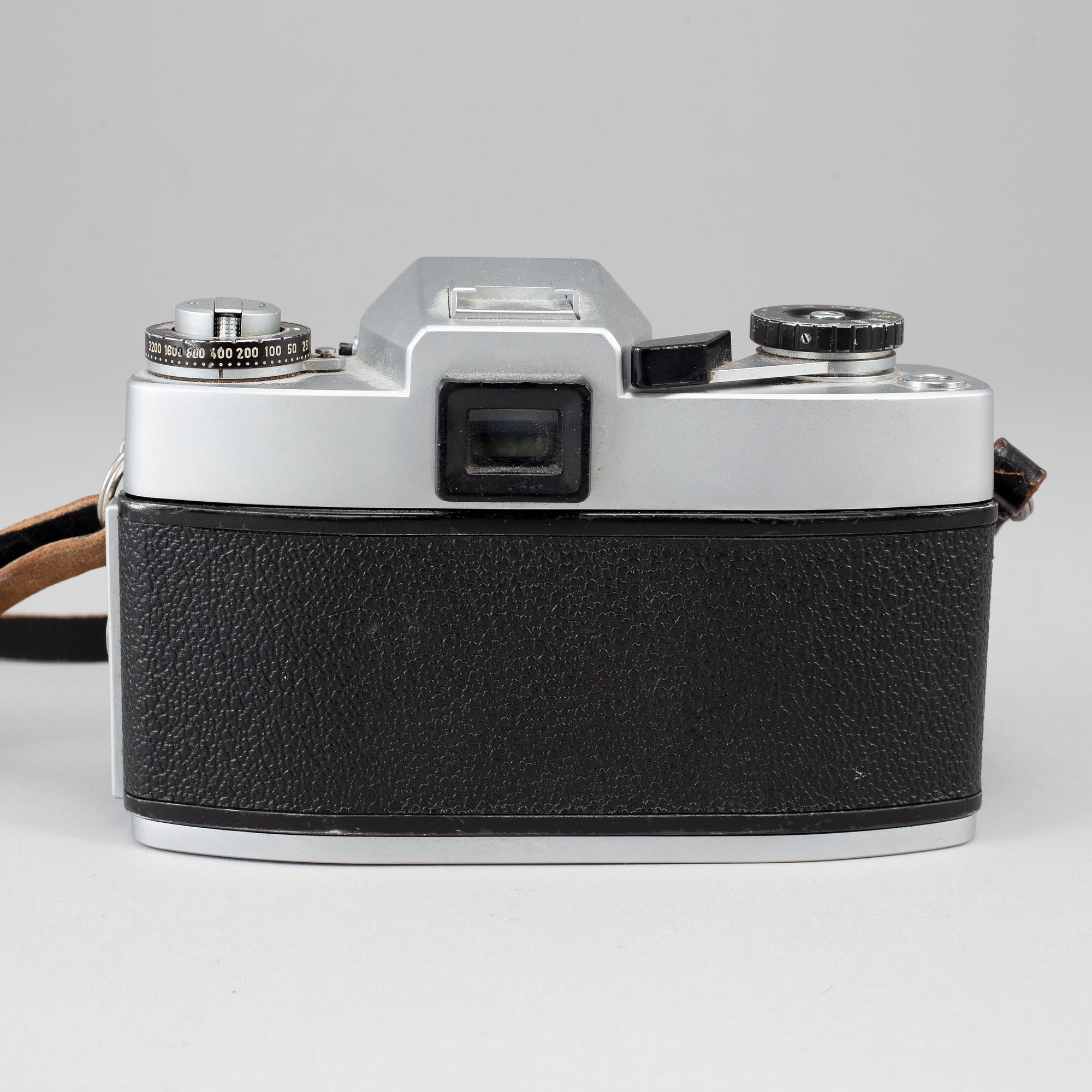 LEICAFLEX SL, with 4 lenses.