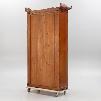 A late Empire mahogany book cabinet, Stockholm 1830's.