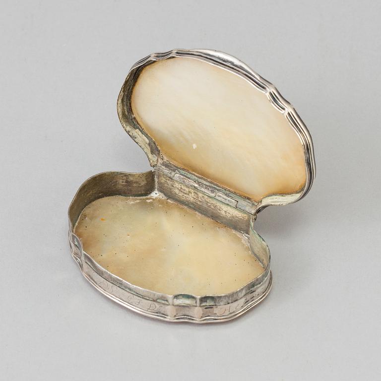 An 18th century silver and mother-of-pearl rococo snuff box.