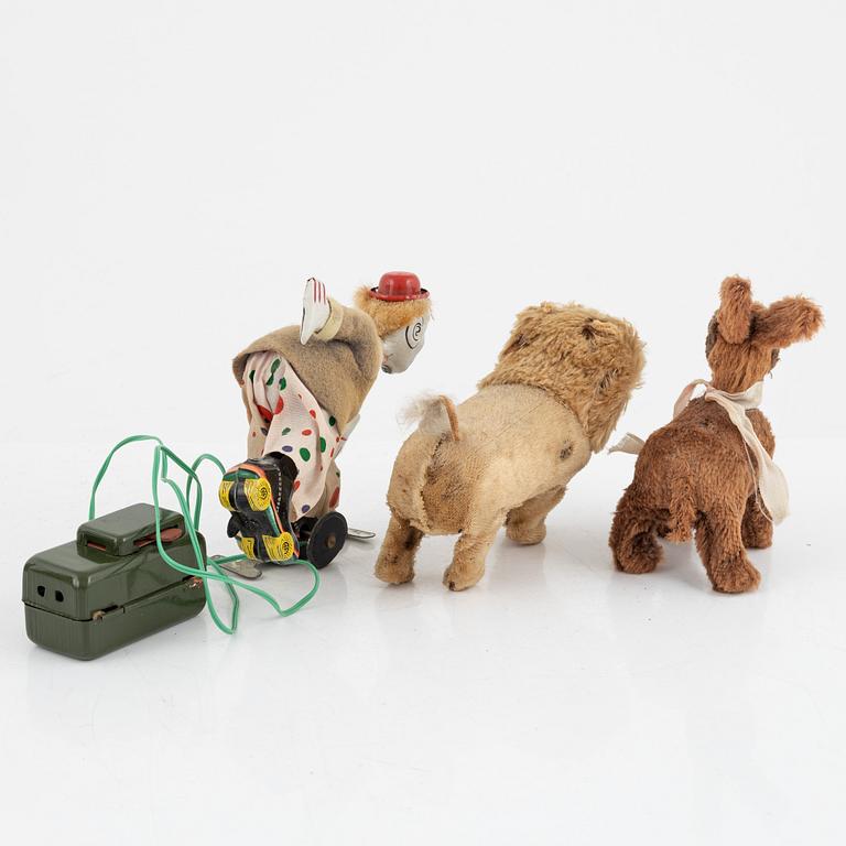 A set of five toys, including 'Rolly' clown from Schuco, 20th century.