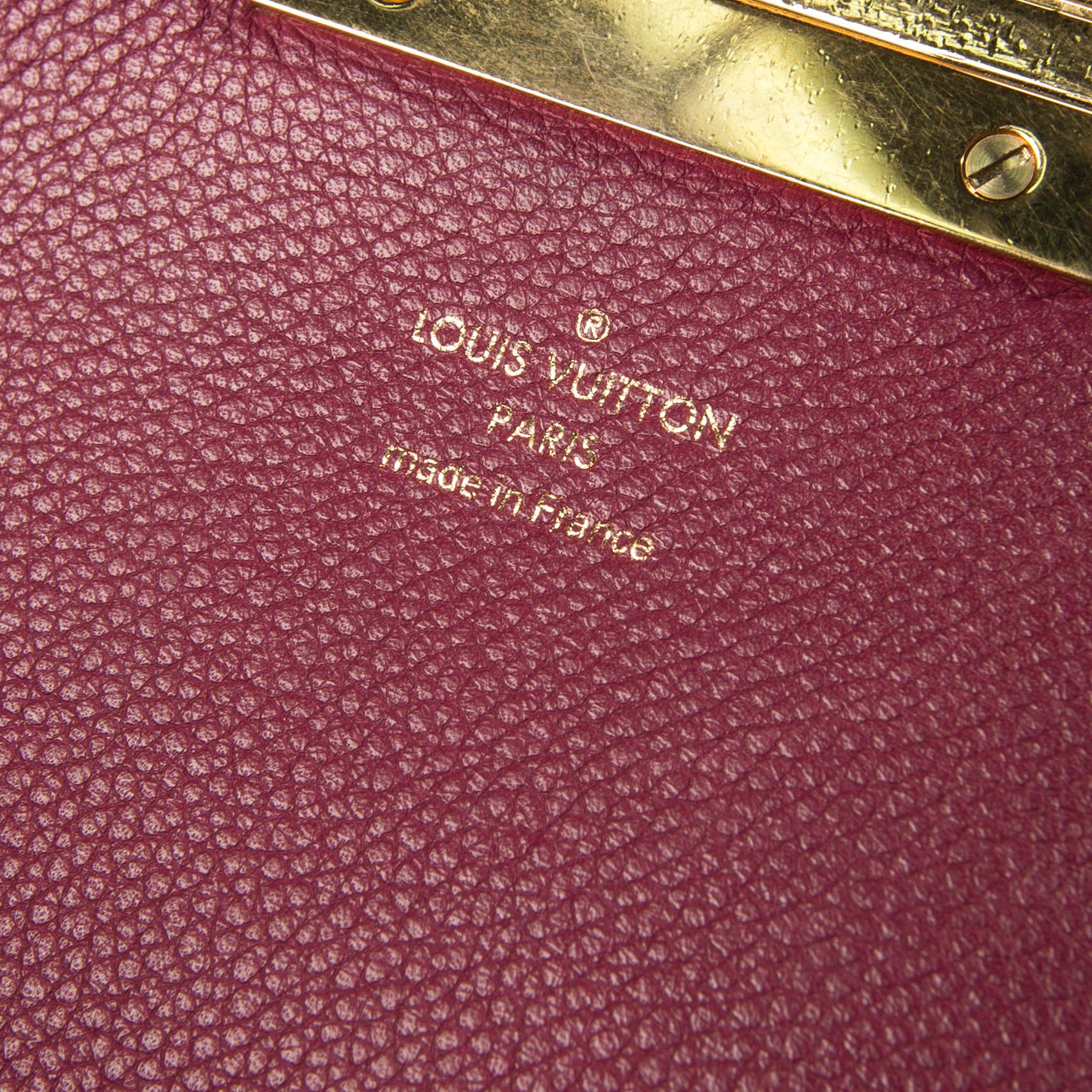 A bag, "Olympe Aurore" by LOUIS VUITTON.