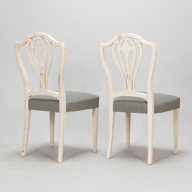 Four George III style chairs, early 20th century.