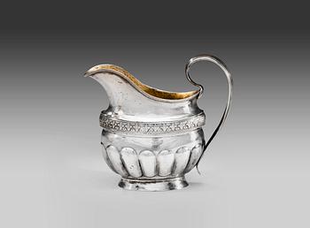 495. A FINNISH SILVER MILK JUG.