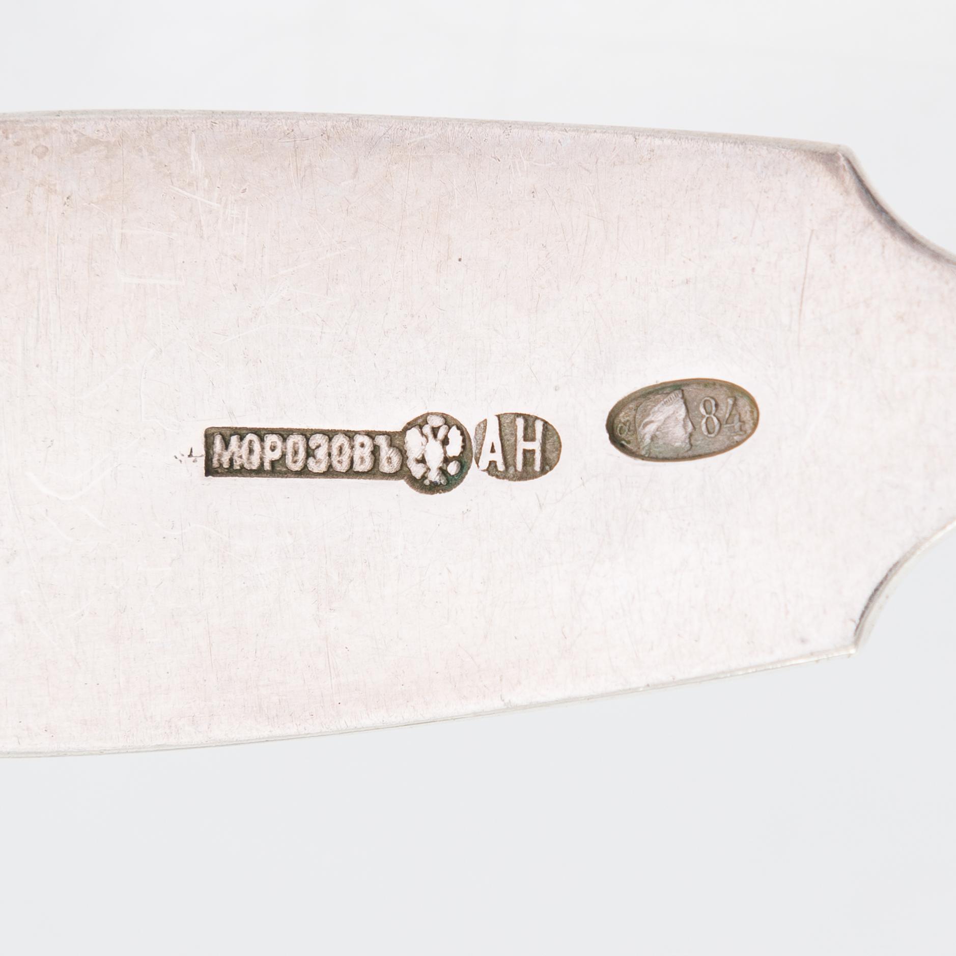 A set of 12 Morozov silver table spoons, master Adam Herttuainen. Imperial Warrant. St Petersburg 1908-17. In oak box.