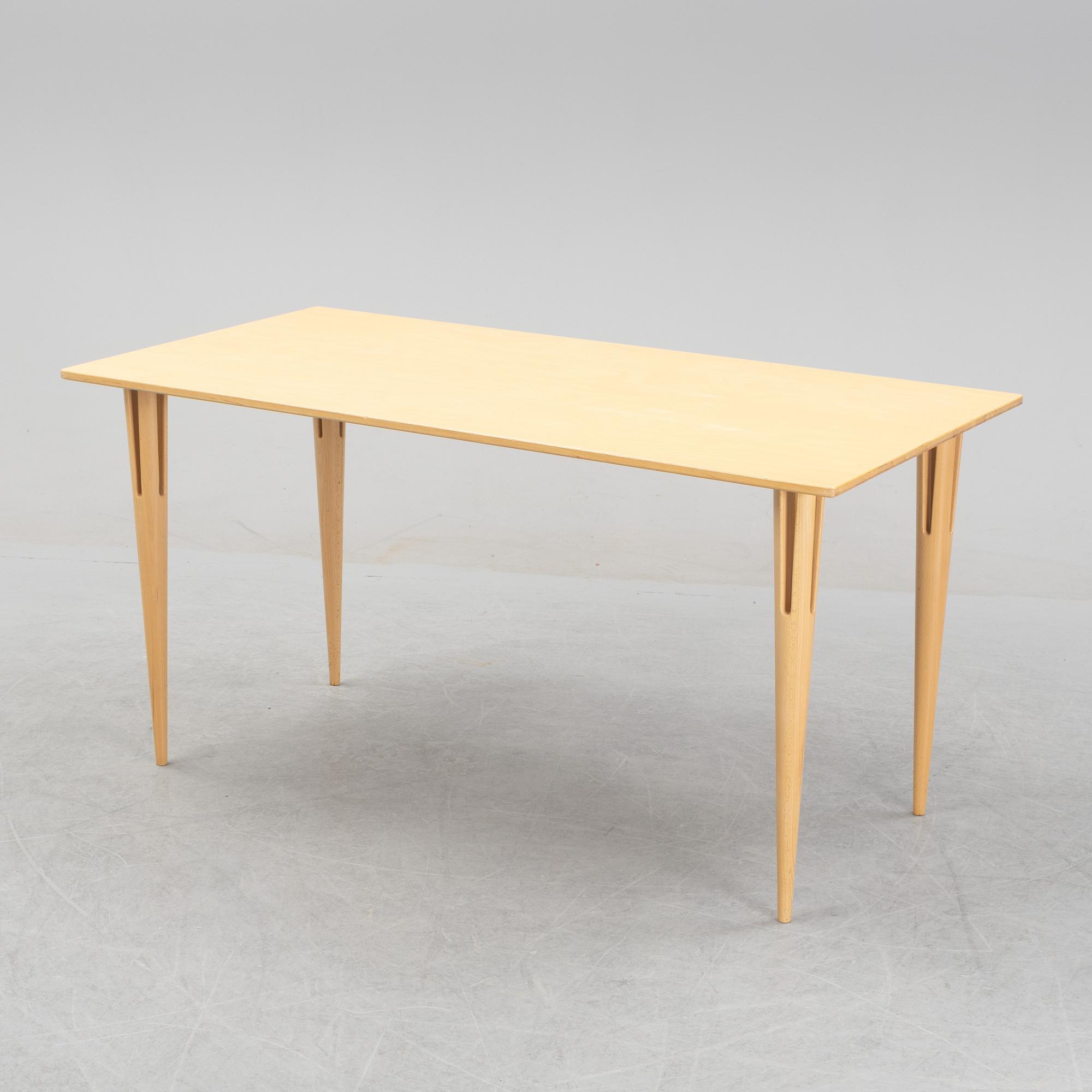 Bruno Mathsson, a birch-veneered dining table from Bruno Mathsson International.