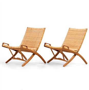 36. Hans J. Wegner, a pair of oak and rattan 'Folding chairs', model 512, Johannes Hansen, Denmark 1950's.