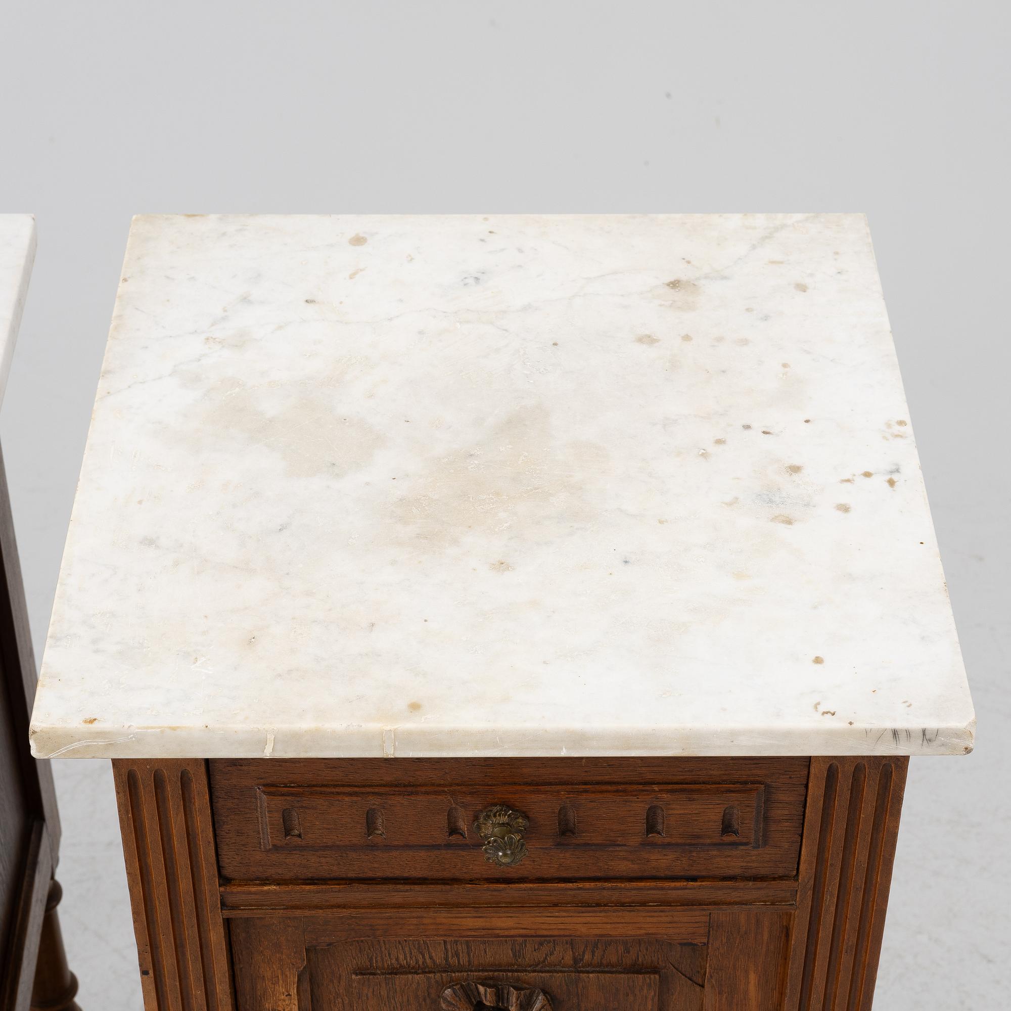 Á pair of bedside tables, circa 1900.