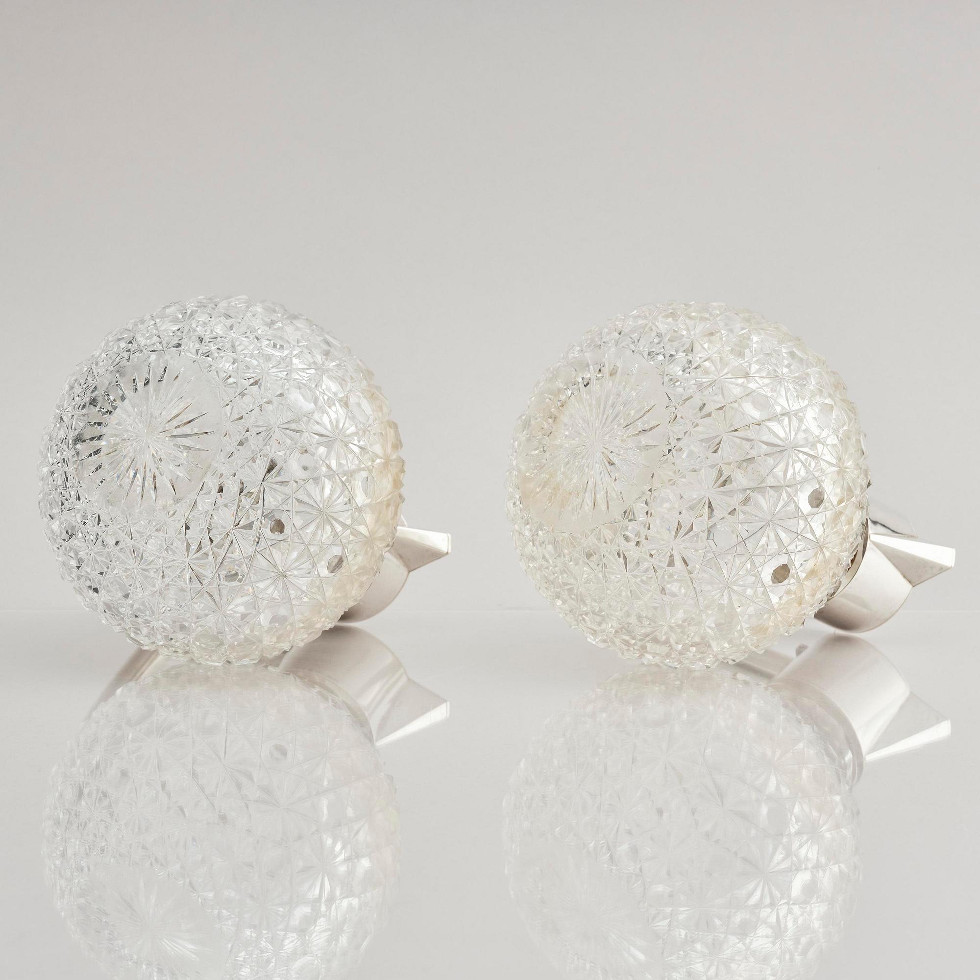 A Swedish pair of silver and cut-glass decanters, mark of C.G. Hallberg, Stockholm 1893.