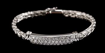 1181. ARMBAND, briljantslipade diamanter, tot. ca 3 ct, med flätat armband i vitguld.