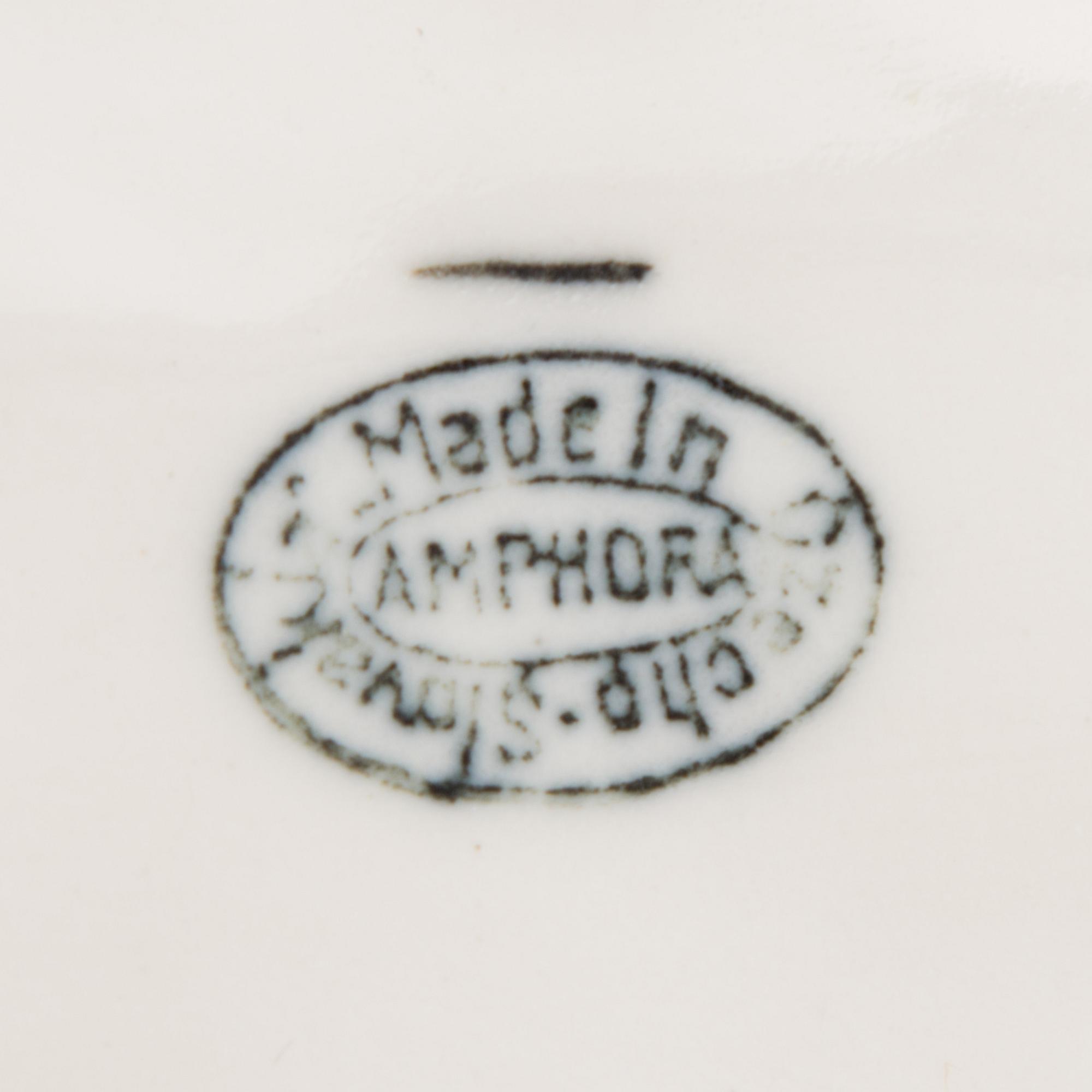 An Amphora porcelain figurine 2882, impressed mark Strasser Wien.