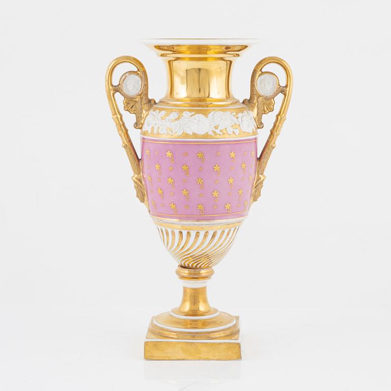 A gilt Empire porcelain vase, 19th Century.