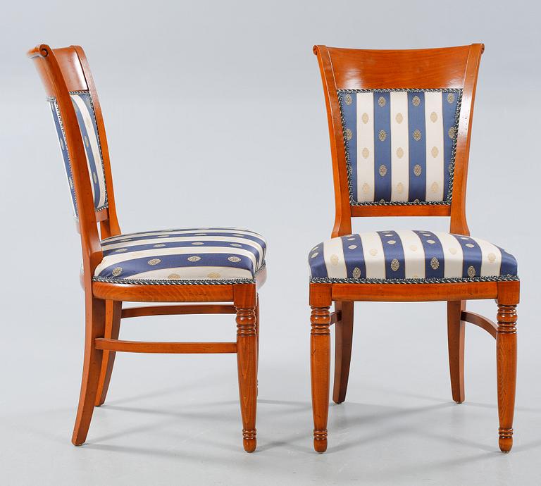 A dining set with seven pieces, designed Louis Philippe, Selva, from late 20th century.