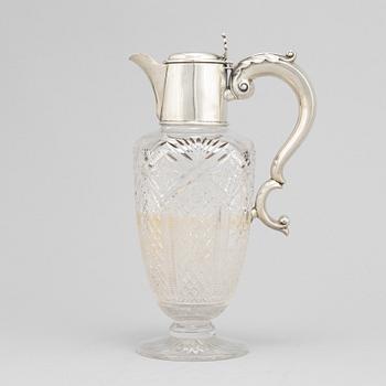 A glass and silver decanter, mark of W Devenport, Birmingham 1902.